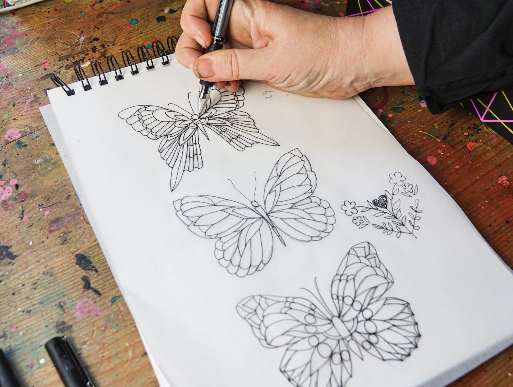 Intricate designs win PIN pens: trace and transfer