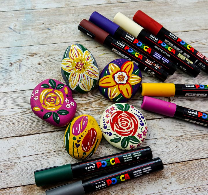Decorate stones with flower designs in POSCA Deep Colours